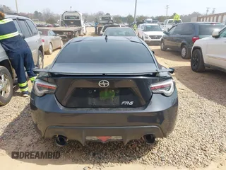 2016 Scion FR-S with VIN JF1ZNAA13G9702833, listed as a IAAI auction lot 41795687 with 71,161 mi miles and . Bid and sale history available at carsss.com. Image 17.