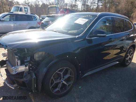 2019 BMW X1 xDrive28i with VIN WBXHT3C50K5L35416, listed as a IAAI auction lot 41195144 with 75,643 mi miles. Bid and sale history available at carsss.com. Image 15.