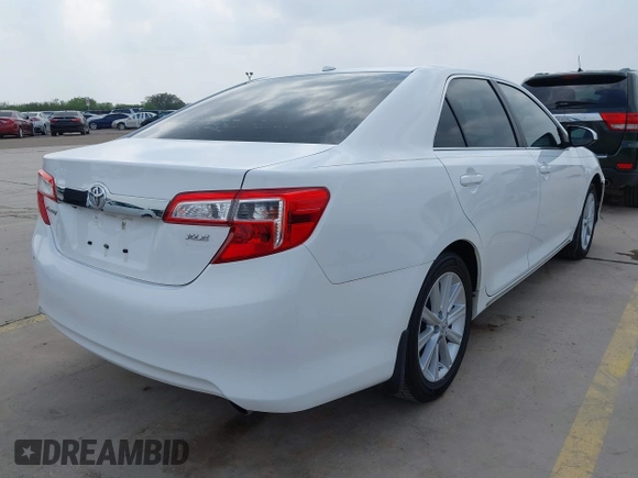 2014 Toyota Camry SE with VIN 4T1BK1FK5EU551196, listed as a IAAI auction lot 41912297 with 104,445 mi miles. Bid and sale history available at carsss.com. Image 4.