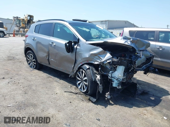 2018 Kia Sportage EX z VIN KNDPNCAC6J7401698, wystawiony jako IAAI lot #42071433 z przebiegiem 88 782 mil mil oraz . Historia ofert i sprzedaży dostępna na DreamBid. Obrazek 1.