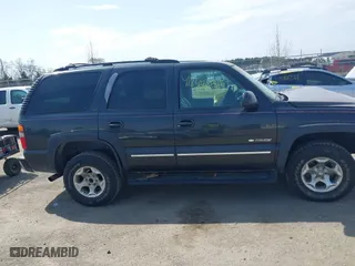 2003 Chevrolet Tahoe Z71 with VIN 1GNEK13Z13R166468, listed as a IAAI auction lot 41848131 with 163,738 mi miles. Bid and sale history available at carsss.com. Image 13.