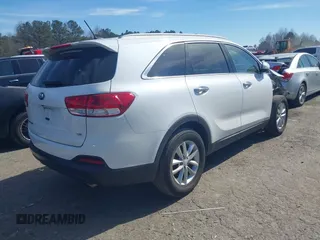 2018 Kia Sorento LX V6 with VIN 5XYPGDA57JG371874, listed as a IAAI auction lot 41668457 with 130,022 mi miles. Bid and sale history available at carsss.com. Image 4.