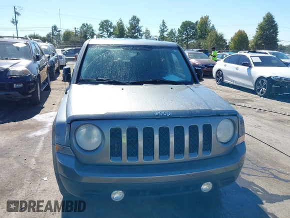 2013 Jeep Patriot Latitude with VIN 1C4NJPFB7DD254744, listed as a IAAI auction lot 40540820 with 129,465 mi miles and . Bid and sale history available at carsss.com. Image 12.