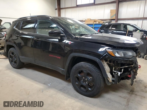 2023 Jeep Compass Trailhawk with VIN 3C4NJDDNXPT506660, listed as a Copart auction lot 56154445 with 92,473 mi miles and Salvage title. Bid and sale history available at DreamBid. Image 4.