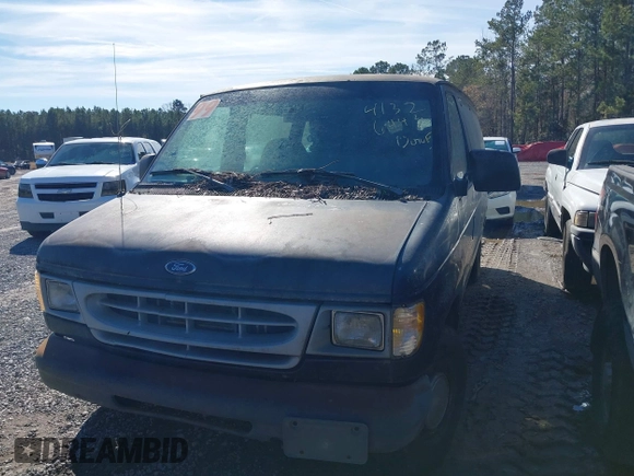 1999 Ford Econoline Cargo with VIN 1FTRE1422XHA33460, listed as a IAAI auction lot 41326443 with 119,294 mi miles. Bid and sale history available at carsss.com. Image 2.
