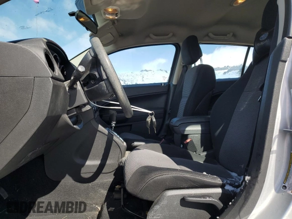 2010 Dodge Caliber SXT z VIN 1B3CB4HA4AD597158, wystawiony jako Copart lot #51757335 z przebiegiem 128 791 mil mil oraz Czysty tytuł • Clean title. Historia ofert i sprzedaży dostępna na DreamBid. Obrazek 7.