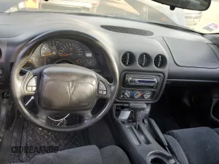 2001 Pontiac Firebird Firebird z VIN 2G2FS22K512146722, wystawiony jako Copart lot #78501634 z przebiegiem 171 387 mil mil oraz Szkoda całkowita • Salvage title. Historia ofert i sprzedaży dostępna na DreamBid. Obrazek 8.