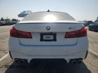 2019 BMW M5 z VIN WBSJF0C53KB284878, wystawiony jako Copart lot #59773965 z przebiegiem Nie podano mil oraz Szkoda całkowita • Salvage title. Historia ofert i sprzedaży dostępna na DreamBid. Obrazek 6.