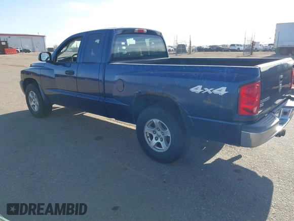 2005 Dodge Dakota SLT with VIN 1D7HW42N15S365967, listed as a IAAI auction lot 41798935 with 220,243 mi miles and . Bid and sale history available at DreamBid. Image 3.