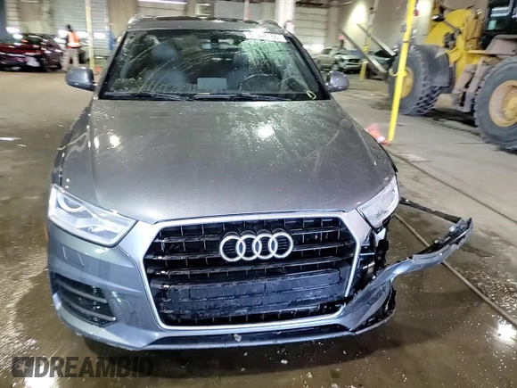 2017 Audi Q3 Premium z VIN WA1BCCFS8HR016720, wystawiony jako Copart lot #51948765 z przebiegiem 98 043 mil mil oraz Czysty tytuł • Clean title. Historia ofert i sprzedaży dostępna na DreamBid. Obrazek 14.