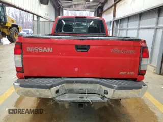 1999 Nissan Frontier XE with VIN 1N6ED26Y5XC308158, listed as a Copart auction lot 84320904 with 316,532 mi miles and Clean title. Bid and sale history available at DreamBid. Image 6.