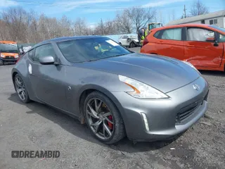 2014 Nissan 370Z with VIN JN1AZ4EH6EM631130, listed as a IAAI auction lot 41838492 with 38,417 mi miles. Bid and sale history available at carsss.com. Image 1.