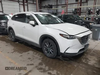 2020 Mazda CX-9 Touring z VIN JM3TCBCY8L0405360, wystawiony jako IAAI lot #41419428 z przebiegiem 69 917 mil mil oraz . Historia ofert i sprzedaży dostępna na DreamBid. Obrazek 1.