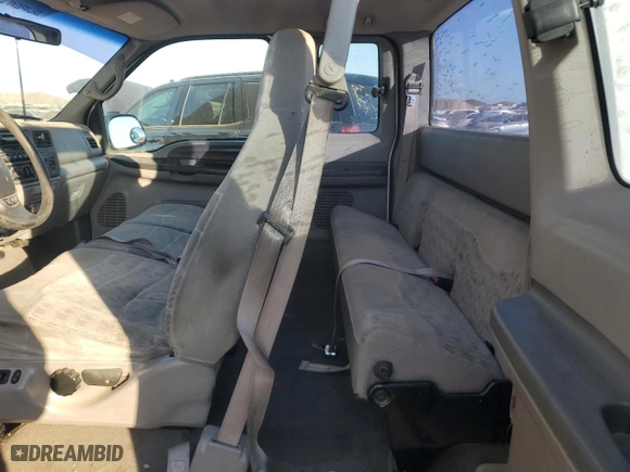 1999 Ford Super Duty F-250 XL with VIN 1FTNX21L5XEE86694, listed as a Copart auction lot 41697885 with 153,948 mi miles and Salvage Title. Bid and sale history available at carsss.com. Image 10.