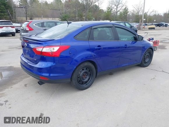 2014 Ford Focus SE with VIN 1FADP3F21EL314534, listed as a IAAI auction lot 42130032 with 103,866 mi miles. Bid and sale history available at carsss.com. Image 4.