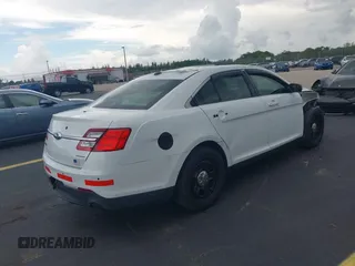 2015 Ford Police Interceptor with VIN 1FAHP2L83FG149326, listed as a IAAI auction lot 42477215 with 90,679 mi miles and . Bid and sale history available at DreamBid. Image 4.