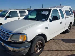 2001 Ford F-150 XL z VIN 1FTRX17L81KF01832, wystawiony jako IAAI lot #41382117 z przebiegiem 226 228 mil mil oraz . Historia ofert i sprzedaży dostępna na DreamBid. Obrazek 2.