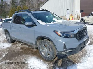 2022 Honda Ridgeline RTL-E z VIN 5FPYK3F73NB035246, wystawiony jako IAAI lot #41532768 z przebiegiem 37 116 mil mil oraz . Historia ofert i sprzedaży dostępna na DreamBid. Obrazek 1.