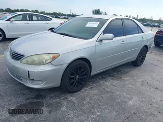 2005 Toyota Camry LE with VIN 4T1BE30K35U572110, listed as a IAAI auction lot 42674324 with 147,480 mi miles and . Bid and sale history available at DreamBid. Image 2.