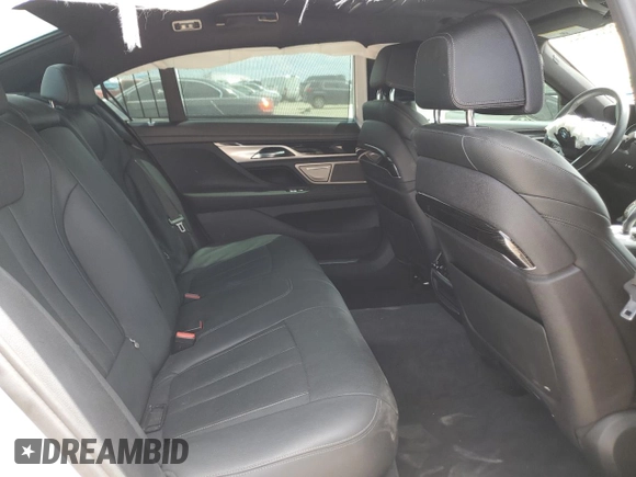 2018 BMW 7 Series 740i with VIN WBA7E2C51JG742075, listed as a Copart auction lot 65057923 with 0 mi miles. Bid and sale history available at carsss.com. Image 10.