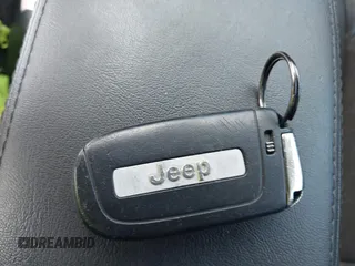 2021 Jeep Compass Latitude z VIN 3C4NJDBB8MT555358, wystawiony jako IAAI lot #42262036 z przebiegiem 67 917 mil mil oraz . Historia ofert i sprzedaży dostępna na DreamBid. Obrazek 11.