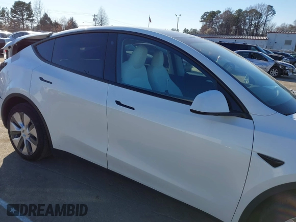 2023 Tesla Model Y Long Range with VIN 7SAYGDEE5PA094253, listed as a IAAI auction lot 41701966 with 29,458 mi miles and . Bid and sale history available at DreamBid. Image 13.