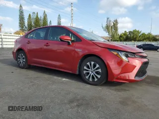2021 Toyota Corolla Hybrid LE with VIN JTDEAMDE5MJ012662, listed as a Copart auction lot 52142455 with 138,564 mi miles and Clean Title. Bid and sale history available at carsss.com. Image 4.