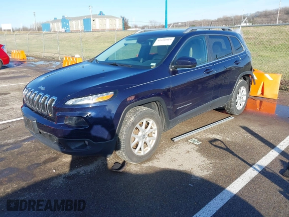 2015 Jeep Cherokee Latitude with VIN 1C4PJMCS0FW583658, listed as a IAAI auction lot 41106819 with 101,849 mi miles. Bid and sale history available at carsss.com. Image 4.