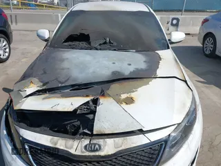 2015 Kia Optima LX with VIN 5XXGM4A78FG464232, listed as a IAAI auction lot 42097937 with Not Provided miles and . Bid and sale history available at DreamBid. Image 13.