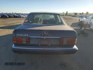 1989 Mercedes-Benz 420 420SEL with VIN WDBCA35E7KA486611, listed as a Copart auction lot 87548585 with 107,075 mi miles and Clean Title. Bid and sale history available at carsss.com. Image 6.