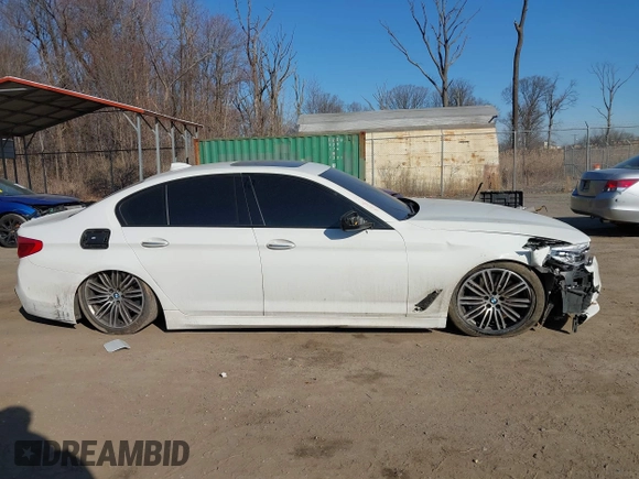2018 BMW 5 Series M550i xDrive with VIN WBAJB9C53JB036097, listed as a IAAI auction lot 41743031 with 70,164 mi miles and . Bid and sale history available at carsss.com. Image 14.