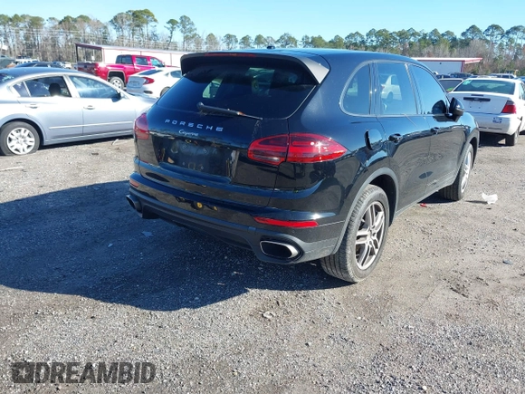 2016 Porsche Cayenne with VIN WP1AA2A21GLA02456, listed as a IAAI auction lot 41309026 with 136,266 mi miles. Bid and sale history available at carsss.com. Image 4.