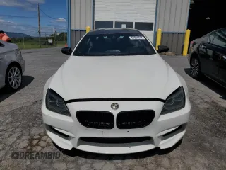 2015 BMW M6 z VIN WBS6C9C52FD467752, wystawiony jako Copart lot #67884554 z przebiegiem 60 729 mil mil oraz Szkody całkowita. Historia ofert i sprzedaży dostępna na DreamBid. Obrazek 5.