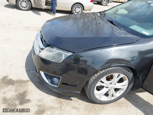 2012 Ford Fusion SE with VIN 3FAHP0HA8CR276237, listed as a IAAI auction lot 42048715 with 1,799,668 mi miles. Bid and sale history available at carsss.com. Image 6.