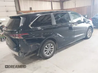 2023 Toyota Sienna XLE z VIN 5TDYRKEC5PS148076, wystawiony jako IAAI lot #42154673 z przebiegiem 169 197 mil mil oraz . Historia ofert i sprzedaży dostępna na DreamBid. Obrazek 4.
