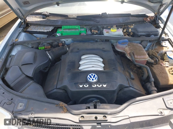 2003 Volkswagen Passat GLX z VIN WVWYH63B43E326130, wystawiony jako IAAI lot #42380050 z przebiegiem 156 338 mil mil oraz . Historia ofert i sprzedaży dostępna na DreamBid. Obrazek 10.