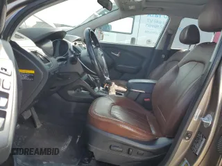 2010 Hyundai Tucson GLS with VIN KM8JU3AC8AU056499, listed as a Copart auction lot 53057365 with 119,906 mi miles and Salvage Title. Bid and sale history available at DreamBid. Image 7.