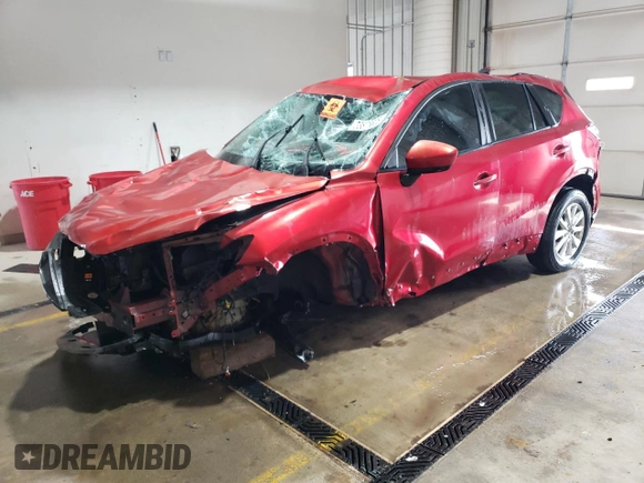 2014 Mazda CX-5 Touring with VIN JM3KE2CY4E0308973, listed as a Copart auction lot 53875605 with 0 mi miles and Salvage Title. Bid and sale history available at carsss.com. Image 1.