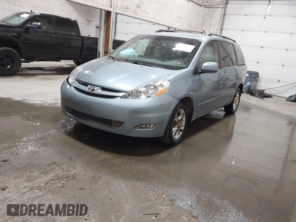 2006 Toyota Sienna XLE with VIN 5TDBA22C96S065797, listed as a IAAI auction lot 41966498 with 181,223 mi miles and . Bid and sale history available at DreamBid. Image 2.