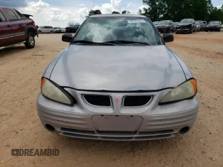 1999 Pontiac Grand Am z VIN 1G2NE12E3XM901263, wystawiony jako Copart lot #55723445 z przebiegiem 163 946 mil mil oraz Szkoda całkowita • Salvage title. Historia ofert i sprzedaży dostępna na DreamBid. Obrazek 5.