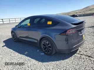 2023 Tesla Model X with VIN 7SAXCAE52PF380229, listed as a Copart auction lot 53535065 with 42,456 mi miles and Salvage Title. Bid and sale history available at DreamBid. Image 2.