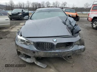 2015 BMW 4 Series 435i xDrive with VIN WBA3T7C56FP942328, listed as a Copart auction lot 52410695 with Not provided miles and Salvage title. Bid and sale history available at DreamBid. Image 5.