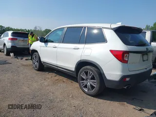 2019 Honda Passport EX-L with VIN 5FNYF8H56KB029748, listed as a IAAI auction lot 42405028 with 59,009 mi miles and . Bid and sale history available at DreamBid. Image 3.