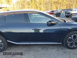 2023 Kia EV6 Wind with VIN KNDC34LA6P5603239, listed as a IAAI auction lot 41071419 with 8,042 mi miles. Bid and sale history available at carsss.com. Image 13.