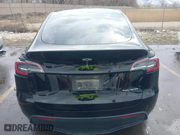 2023 Tesla Model Y Long Range with VIN 7SAYGDEE5PF766685, listed as a IAAI auction lot 41933729 with 25,959 mi miles and . Bid and sale history available at DreamBid. Image 15.