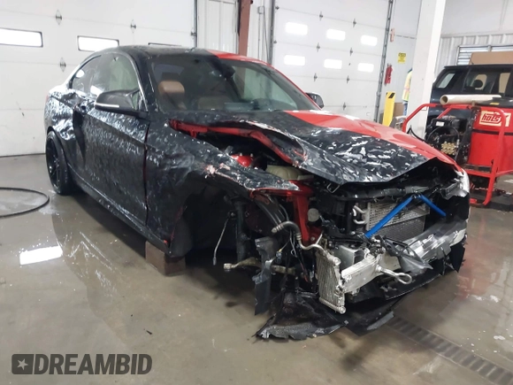 2016 BMW 2 Series M235i with VIN WBA1J7C50GV360056, listed as a IAAI auction lot 41560487 with 120,208 mi miles and . Bid and sale history available at carsss.com. Image 1.