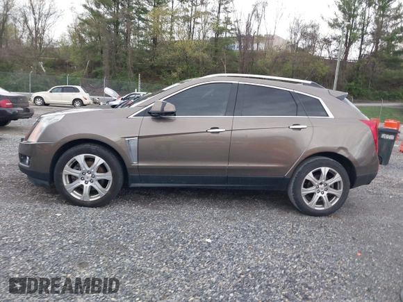 2014 Cadillac SRX Performance Collection with VIN 3GYFNCE33ES570472, listed as a IAAI auction lot 41971511 with 200,811 mi miles. Bid and sale history available at carsss.com. Image 14.