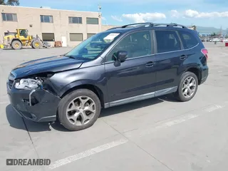 2015 Subaru Forester 2.5i Touring with VIN JF2SJAWC4FH523997, listed as a IAAI auction lot 41884674 with 175,127 mi miles. Bid and sale history available at carsss.com. Image 18.