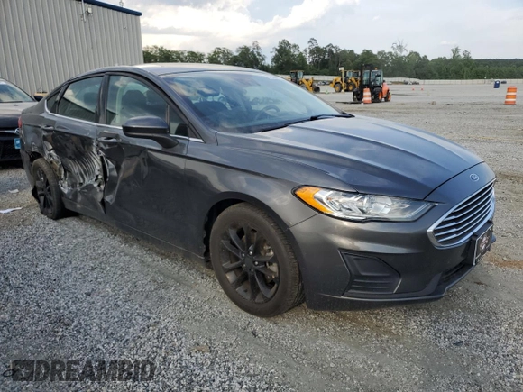 2020 Ford Fusion SE with VIN 3FA6P0HD0LR184251, listed as a Copart auction lot 57325205 with 99,142 mi miles and Salvage title. Bid and sale history available at DreamBid. Image 4.