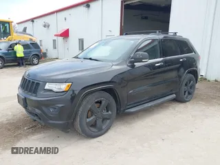 2014 Jeep Grand Cherokee Overland with VIN 1C4RJFCM8EC486259, listed as a IAAI auction lot 42105296 with 129,342 mi miles. Bid and sale history available at carsss.com. Image 17.
